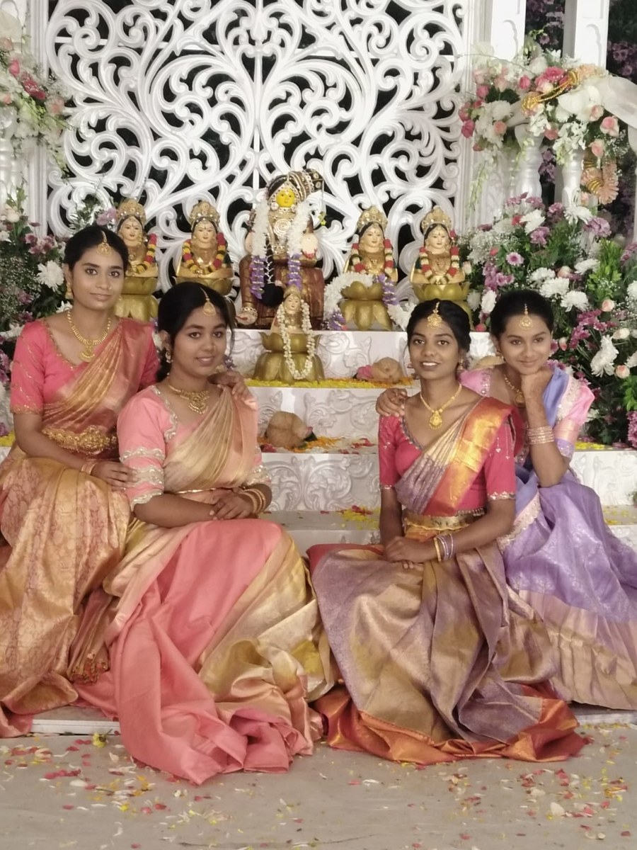 Group of women in matching festive silk saree blouses by Hello Beautiful Boutique