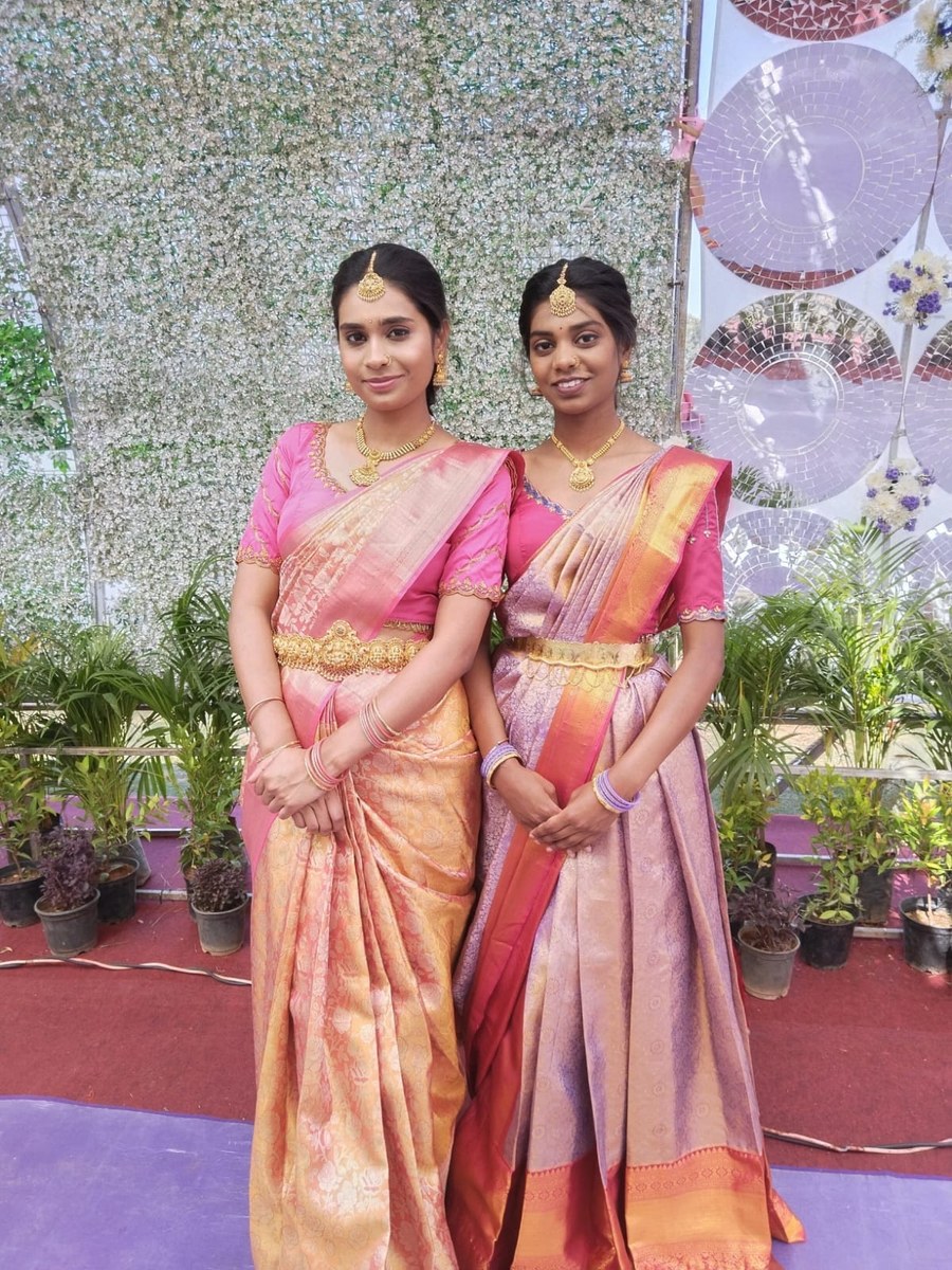 Two women in festive silk saree blouses by Hello Beautiful Boutique