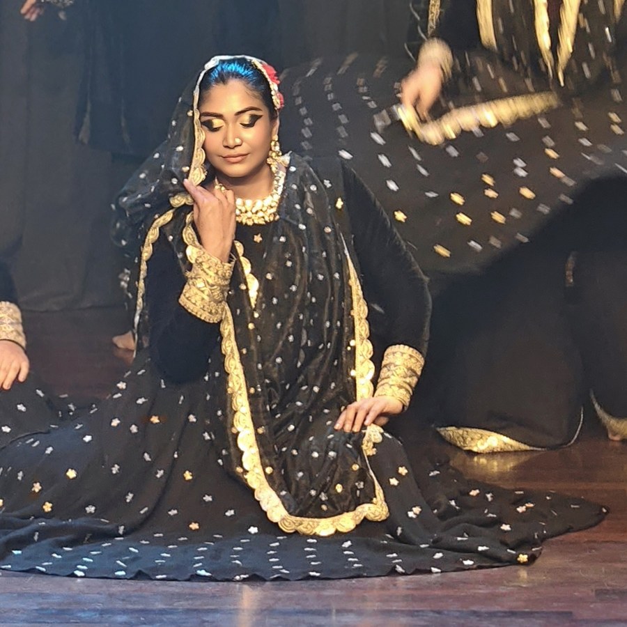 Black and gold embellished dance costume by Hello Beautiful Boutique
