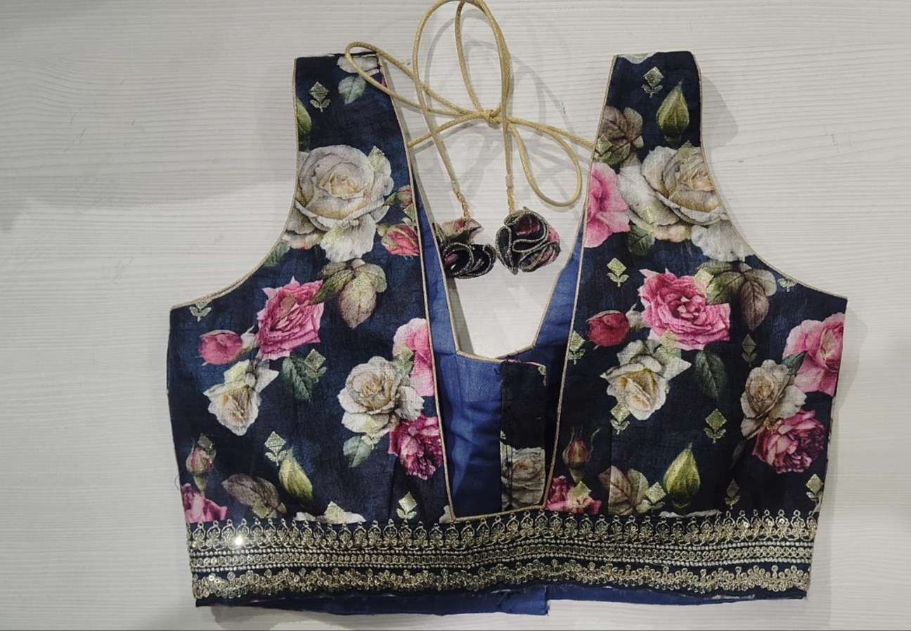 Navy blue deep-neck sleeveless blouse with rose floral print and gold border